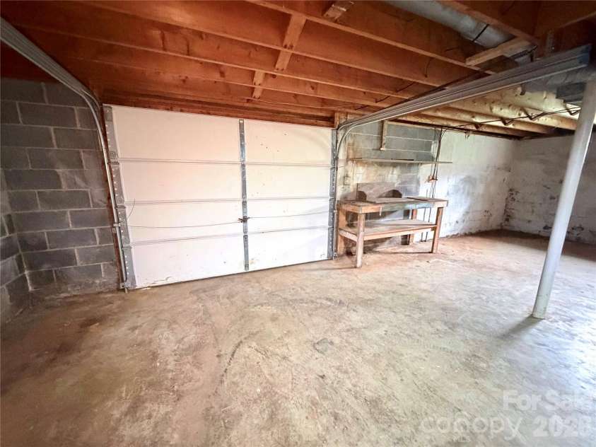 56 Henson Drive, Waynesville, NC 28786.  MLS# CAR4374439, YatesRealty ID 33211. Basement