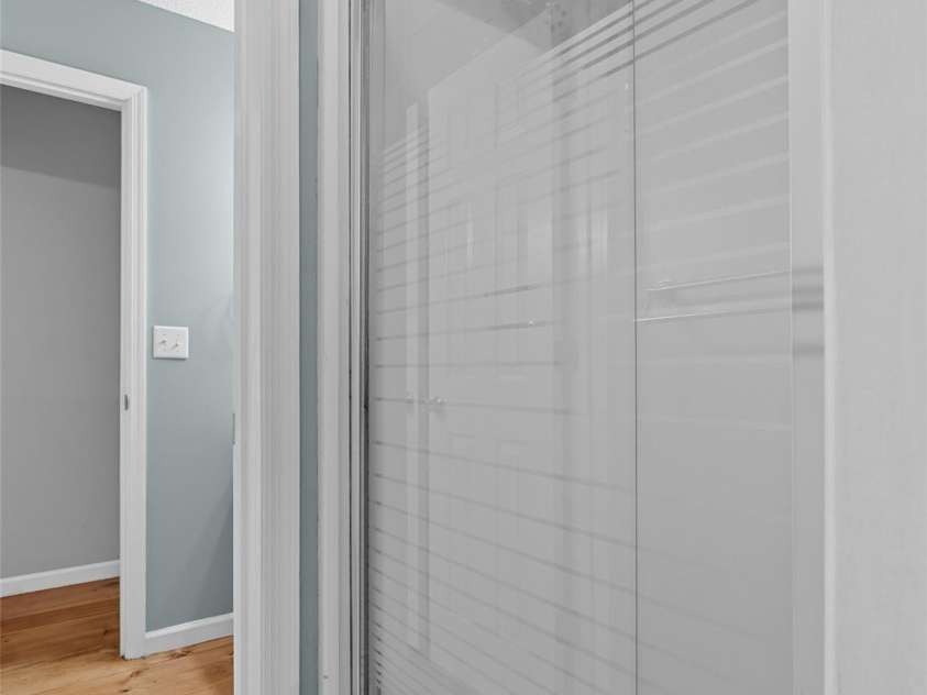 148 Piney Overlook Lane, Saluda, NC 28773.  MLS# CAR4284735, YatesRealty ID 33213. Shower between the two half baths