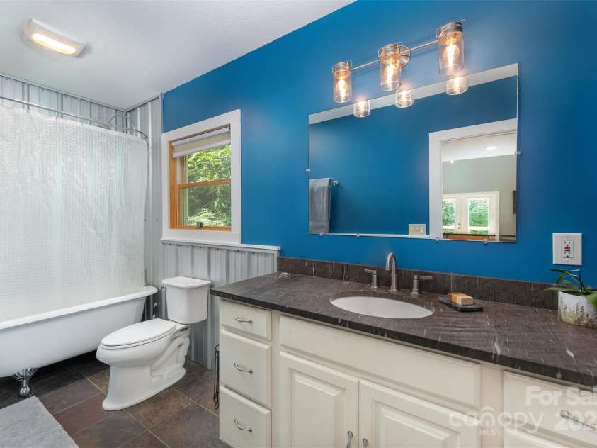 15 Shytle Lane, Fletcher, NC 28732.  MLS# CAR4290247, YatesRealty ID 33216. Primary Bathroom off Bedroom.