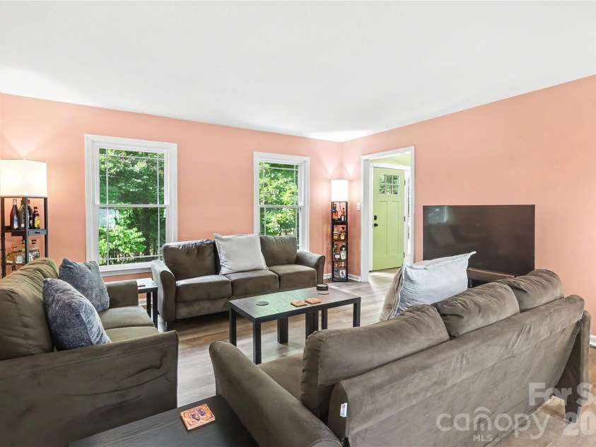 227 Dileen Drive, Concord, NC 28025.  MLS# CAR4396779, YatesRealty ID 33219. Living Room is adjacent to the Front Entrance and the Dining Room