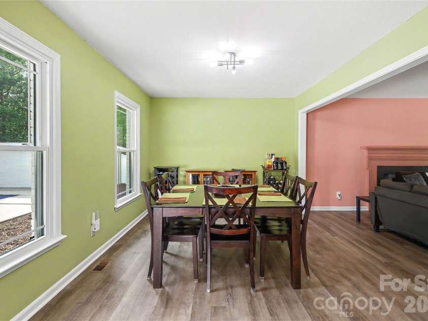 227 Dileen Drive, Concord, NC 28025.  MLS# CAR4396779, YatesRealty ID 33219. The Dining Room has a nice View of the Pool