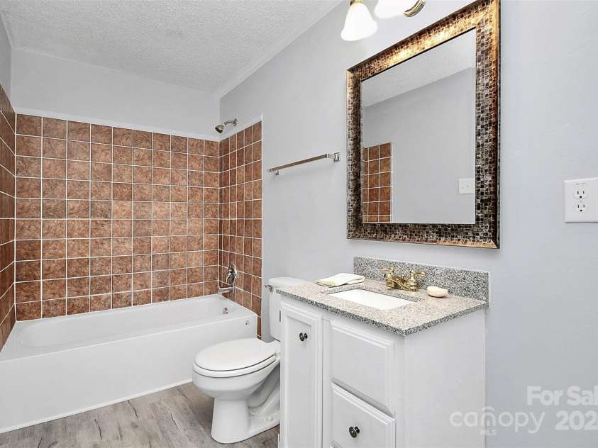 1613 Ohenry Lane, Fort Mill, SC 29708.  MLS# CAR4193922, YatesRealty ID 3322. Hall Bath, new granite sink/counter & faucet