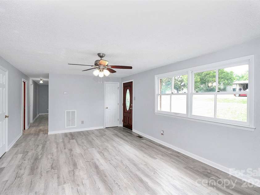 1613 Ohenry Lane, Fort Mill, SC 29708.  MLS# CAR4193922, YatesRealty ID 3322. Living Room from Left