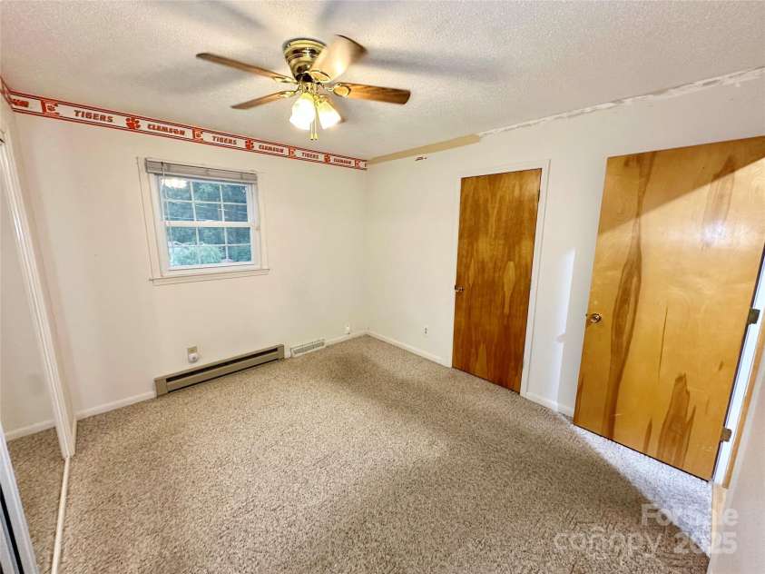 4705 Can Do Court, Gastonia, NC 28056.  MLS# CAR4287219, YatesRealty ID 33229. Bedroom 1 with two closets