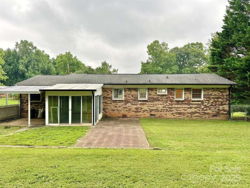 4705 Can Do Court, Gastonia, NC 28056.  MLS# CAR4287219, YatesRealty ID 33229. Brick patio & screened patio