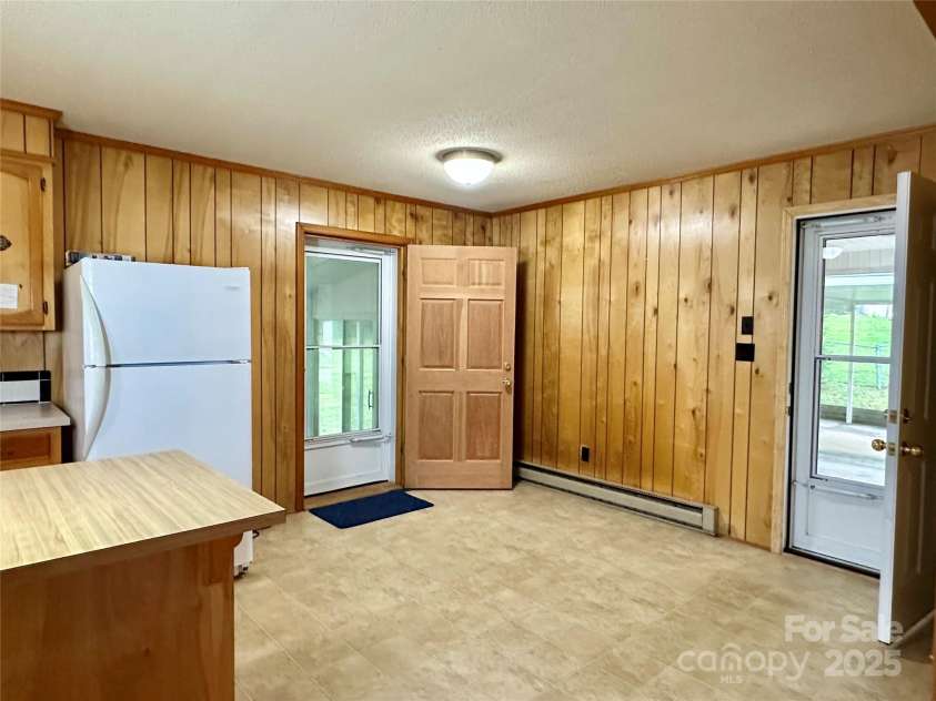 4705 Can Do Court, Gastonia, NC 28056.  MLS# CAR4287219, YatesRealty ID 33229. Eat in kitchen- doors lead to enclosed patio and carport