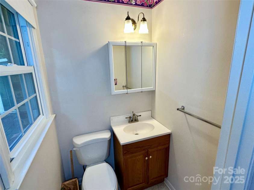 4705 Can Do Court, Gastonia, NC 28056.  MLS# CAR4287219, YatesRealty ID 33229. Half bath- connected to bedroom 3