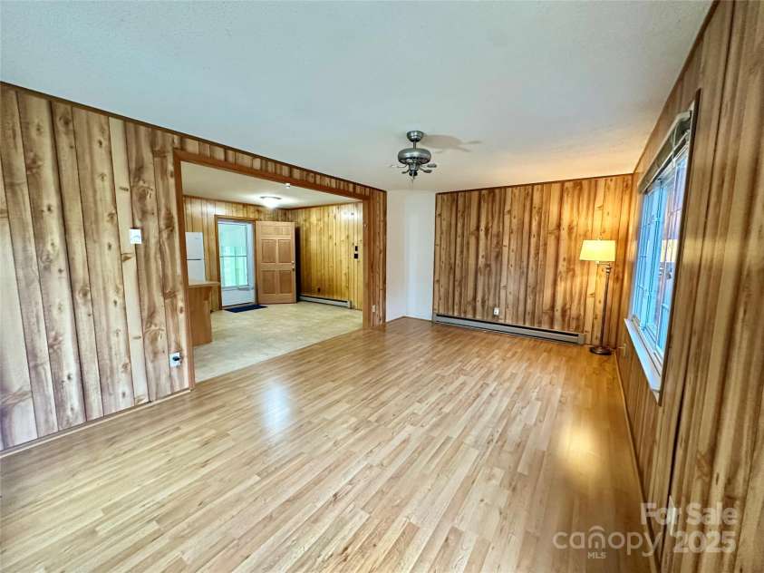4705 Can Do Court, Gastonia, NC 28056.  MLS# CAR4287219, YatesRealty ID 33229. Living room- opens to eat in kitchen