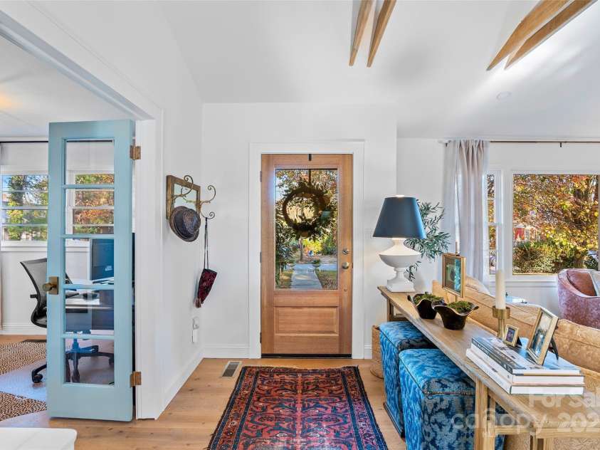 112 Pearson Drive, Asheville, NC 28801.  MLS# CAR4322267, YatesRealty ID 3323. A glance back at your new front door says it all—new interior paint and wide-plank French Oak flooring await. Welcome home!