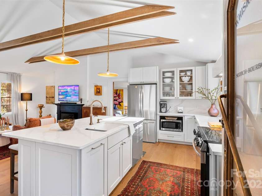 112 Pearson Drive, Asheville, NC 28801.  MLS# CAR4322267, YatesRealty ID 3323. All NEW for YOU… an airy, vaulted living space and a stunning dream kitchen!