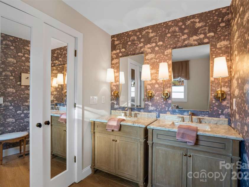 112 Pearson Drive, Asheville, NC 28801.  MLS# CAR4322267, YatesRealty ID 3323. Embrace the lifestyle: relax, rejuvenate, and retreat to your elegant, spa-inspired bathroom.