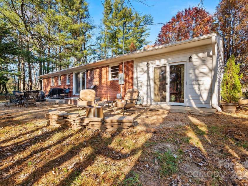 112 Pearson Drive, Asheville, NC 28801.  MLS# CAR4322267, YatesRealty ID 3323. Gather around the fire and enjoy relaxing in your beautiful, low-maintenance yard.