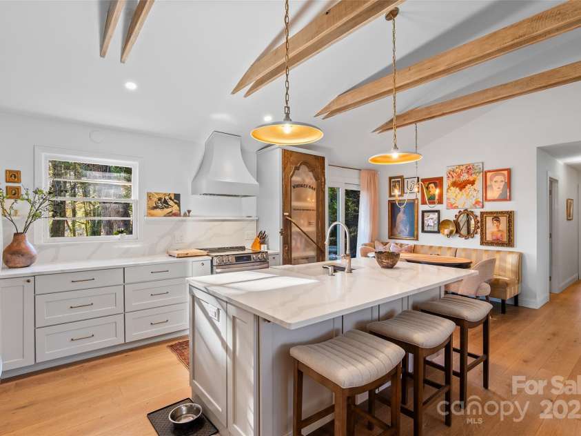 112 Pearson Drive, Asheville, NC 28801.  MLS# CAR4322267, YatesRealty ID 3323. Savor your morning coffee in a stunning new custom kitchen with quartz counters and a generous breakfast island!