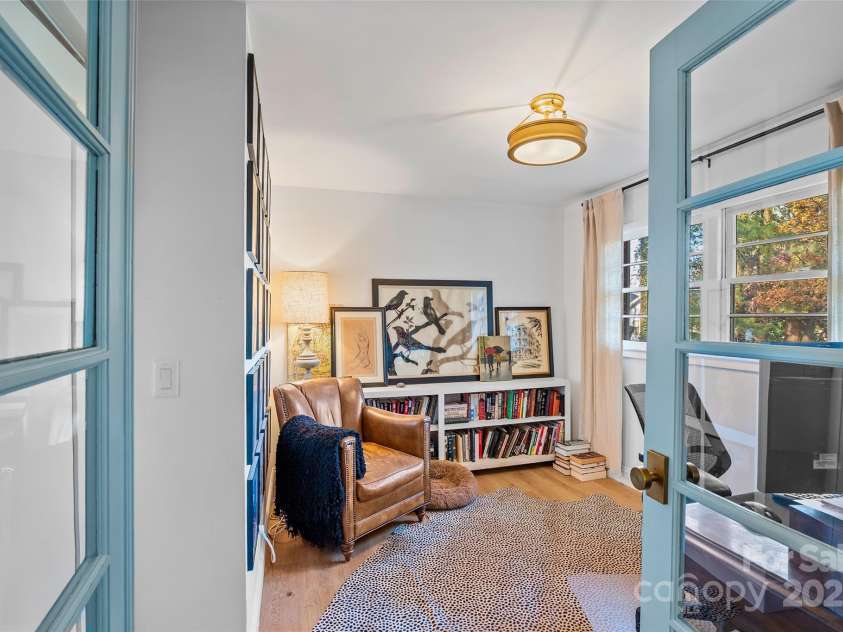 112 Pearson Drive, Asheville, NC 28801.  MLS# CAR4322267, YatesRealty ID 3323. With French doors, enjoy privacy while still staying connected to the open living room, cozy fireplace, and delicious aromas from the kitchen.