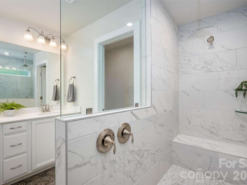 1630 Unison Drive, Charlotte, NC 28262.  MLS# CAR4383072, YatesRealty ID 33230. Primary bath amzing walk in shower.