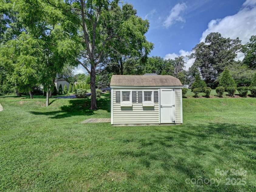 20 Brooks Cove Road, Candler, NC 28715.  MLS# CAR4255964, YatesRealty ID 33230. Out shed for equipment