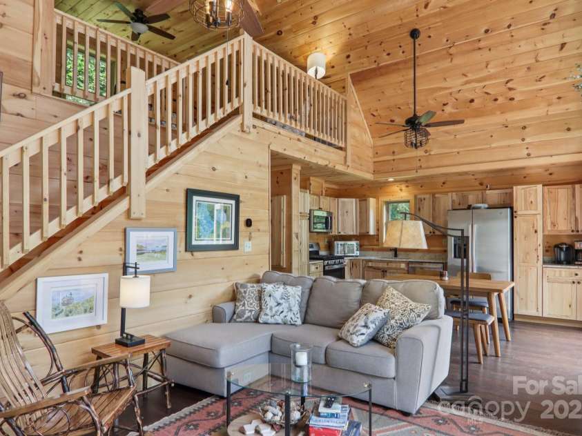 160 Blazing Star Lane, Clyde, NC 28721.  MLS# CAR4292410, YatesRealty ID 33231. Loft above has 2nd  primary suite