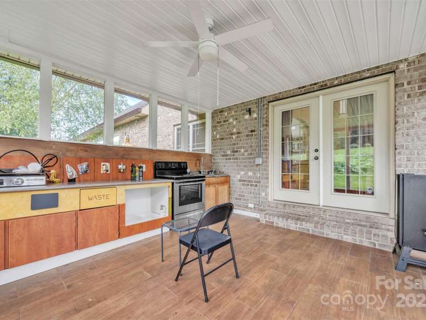 1163 Willow Creek Drive, Newton, NC 28658.  MLS# CAR4290632, YatesRealty ID 33232. Screened in porch/outdoor kitchen