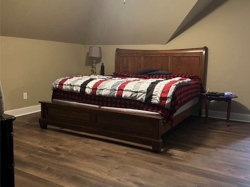 1163 Willow Creek Drive, Newton, NC 28658.  MLS# CAR4290632, YatesRealty ID 33232. Upstairs Primary BR-new floors 2025