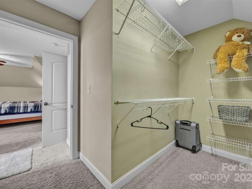 1163 Willow Creek Drive, Newton, NC 28658.  MLS# CAR4290632, YatesRealty ID 33232. Upstairs Primary Walk-in closet