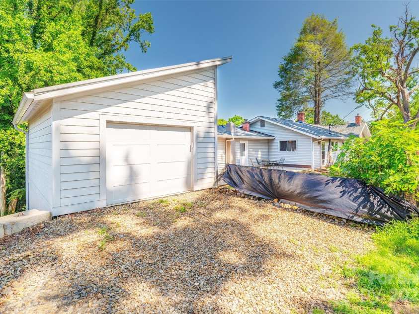 34 Vandalia Avenue, Asheville, NC 28806.  MLS# CAR4276401, YatesRealty ID 33234. One Car Garage with storage below