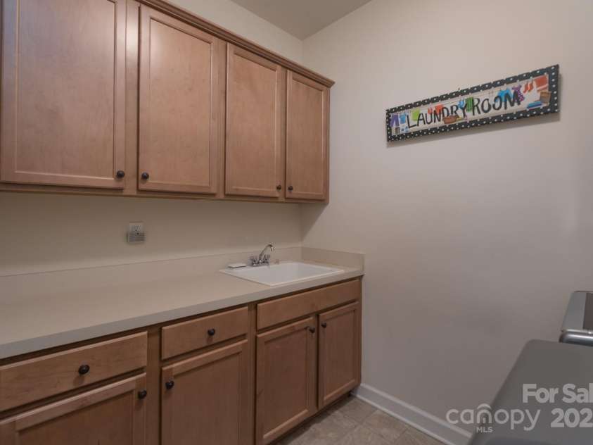 866 Tyne Drive, Fort Mill, SC 29715.  MLS# CAR4248986, YatesRealty ID 33238. Upper Level Laundry Room