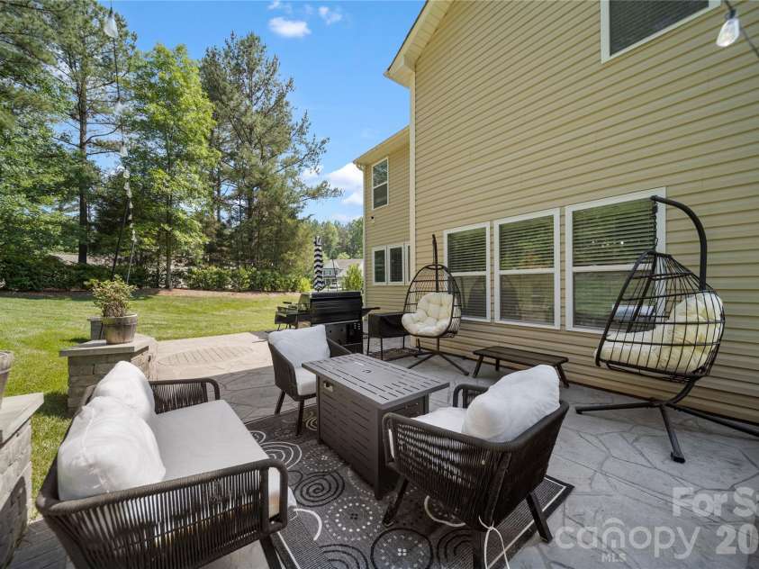 8122 Mossy Rock Road, Waxhaw, NC 28173.  MLS# CAR4382633, YatesRealty ID 33242. Exterior back