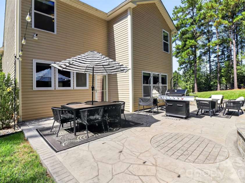 8122 Mossy Rock Road, Waxhaw, NC 28173.  MLS# CAR4430192, YatesRealty ID 33242. Large paved patio