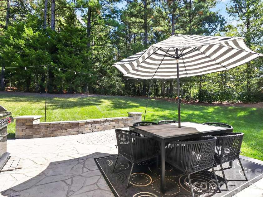 8122 Mossy Rock Road, Waxhaw, NC 28173.  MLS# CAR4430192, YatesRealty ID 33242. Private backyard