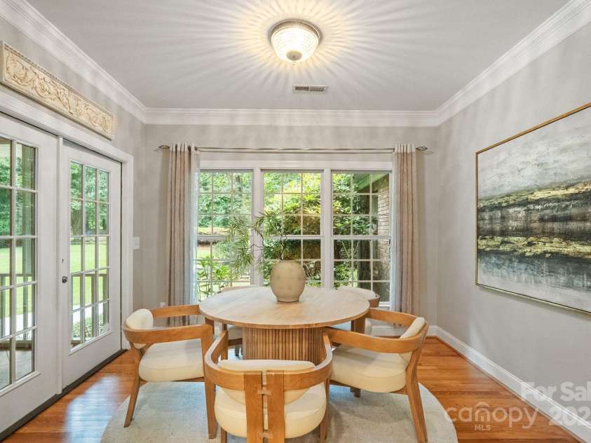 501 Colonels Court, Clover, SC 29710.  MLS# CAR4288032, YatesRealty ID 33243. Breakfast nook off of the kitchen with access to the screened in back porch