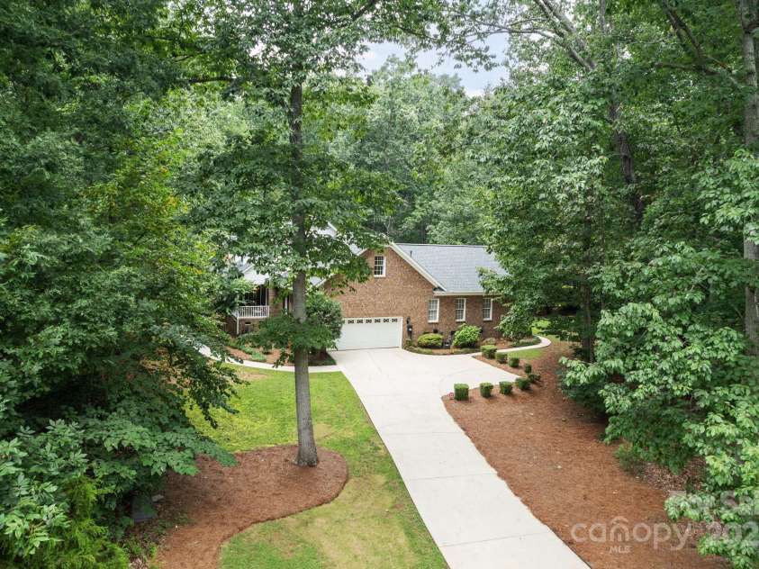 501 Colonels Court, Clover, SC 29710.  MLS# CAR4288032, YatesRealty ID 33243. Long private driveway leading to the attached, oversized 2-car garage