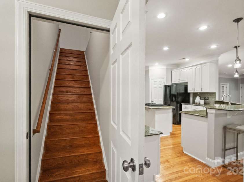 501 Colonels Court, Clover, SC 29710.  MLS# CAR4288032, YatesRealty ID 33243. Stairs leading to the bonus room above the garage