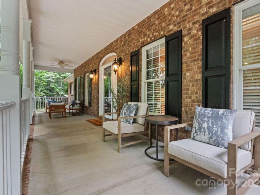 501 Colonels Court, Clover, SC 29710.  MLS# CAR4288032, YatesRealty ID 33243. There are 2 outdoor ceiling fans on the front porch