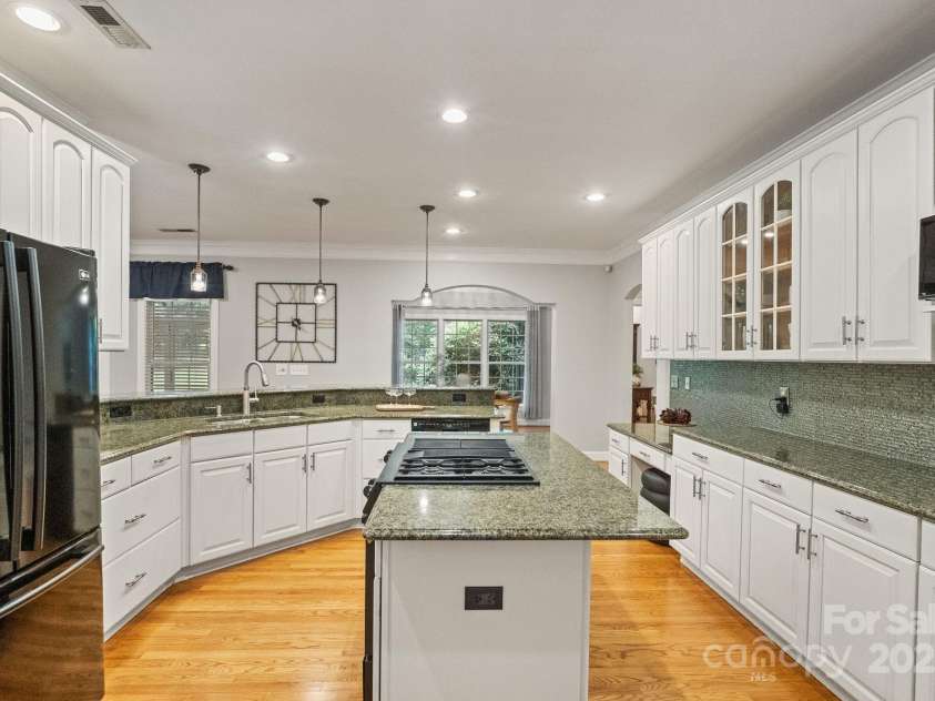 501 Colonels Court, Clover, SC 29710.  MLS# CAR4288032, YatesRealty ID 33243. This kithchen has a gas range and plenty of storage and a walk in pantry