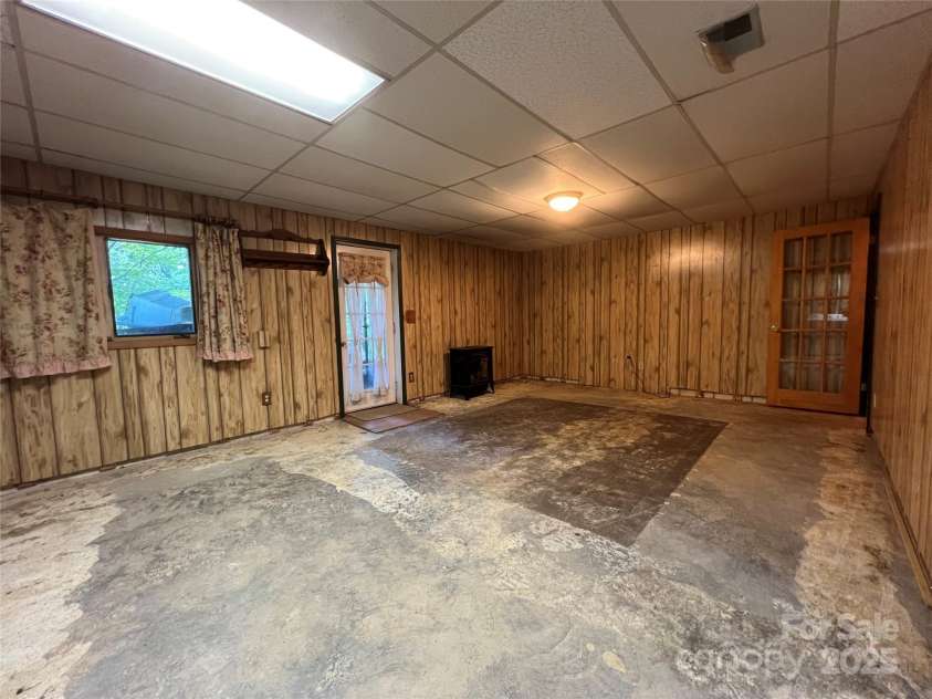 430 Laurel Heights Lane, Tryon, NC 28782.  MLS# CAR4277530, YatesRealty ID 33245. Basement