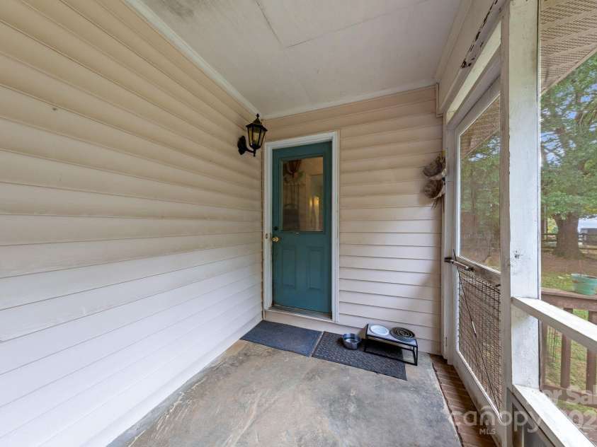 10520 Misty Ridge Lane, Charlotte, NC 28277.  MLS# CAR4309596, YatesRealty ID 33247. Back Porch