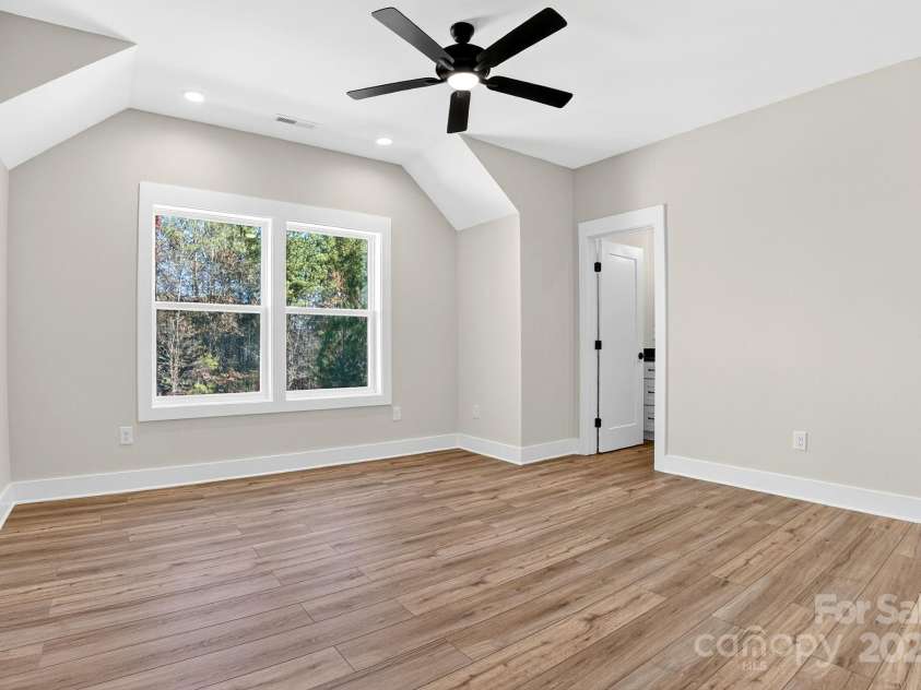 51 Windsor Drive, Taylorsville, NC 28681.  MLS# CAR4325749, YatesRealty ID 3325. 2nd Floor Ensuite Bedroom