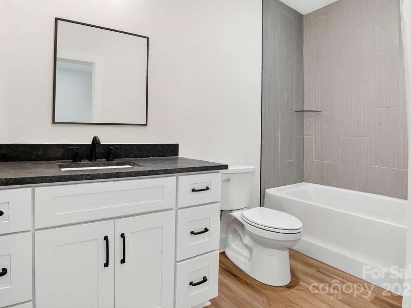 51 Windsor Drive, Taylorsville, NC 28681.  MLS# CAR4325749, YatesRealty ID 3325. 2nd Floor Ensuite Bedroom