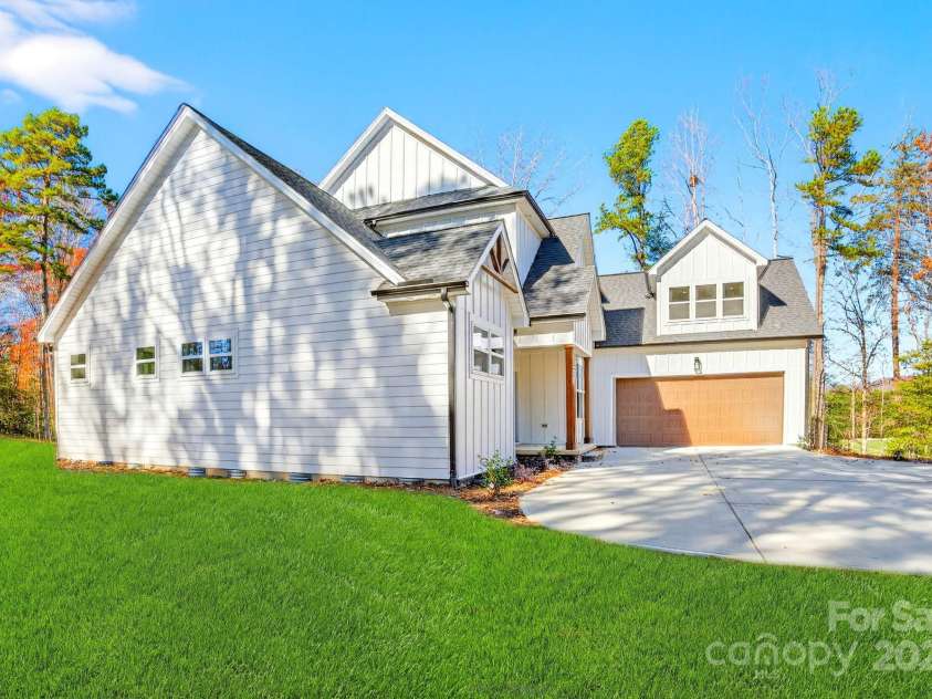 51 Windsor Drive, Taylorsville, NC 28681.  MLS# CAR4325749, YatesRealty ID 3325. Left Side - Exterior