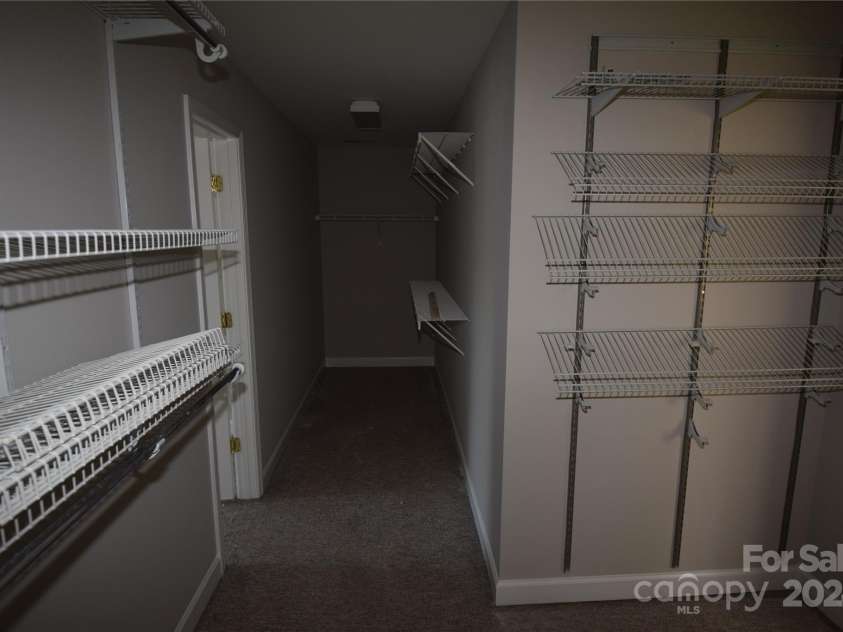 809 Pine Forest Road, Charlotte, NC 28214.  MLS# CAR4203407, YatesRealty ID 3326. Huge primary walk in closet.