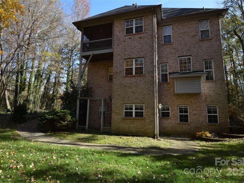 809 Pine Forest Road, Charlotte, NC 28214.  MLS# CAR4203407, YatesRealty ID 3326. Rear view of house.