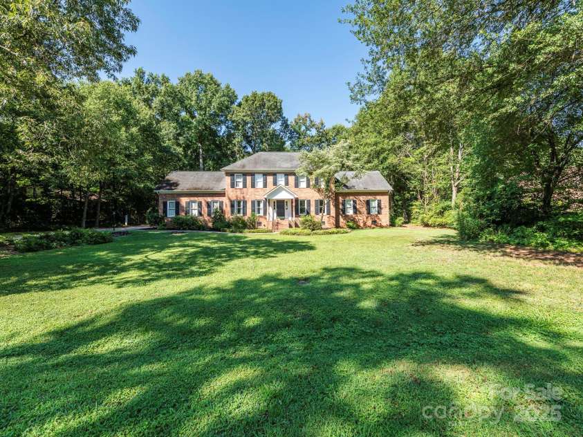 1231 Bennington Drive, Concord, NC 28027.  MLS# CAR4285344, YatesRealty ID 33260. ALMOST 1 ACRE LOT