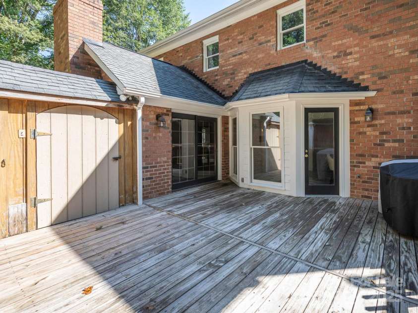 1231 Bennington Drive, Concord, NC 28027.  MLS# CAR4285344, YatesRealty ID 33260. DECK LEADING INTO BREAKFAST AREA AND LIVING ROOM