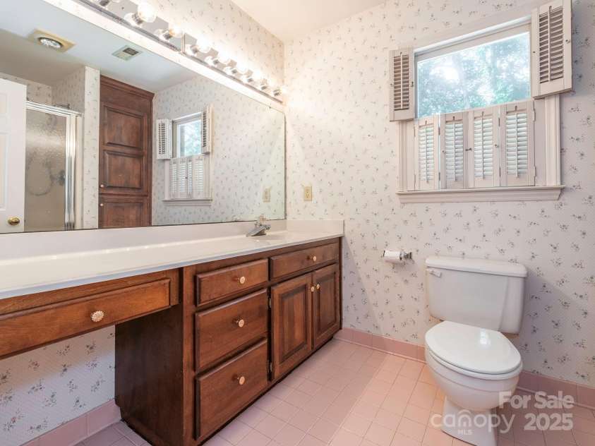 1231 Bennington Drive, Concord, NC 28027.  MLS# CAR4285344, YatesRealty ID 33260. UPPER FULL BATH STAND UP SHOWER