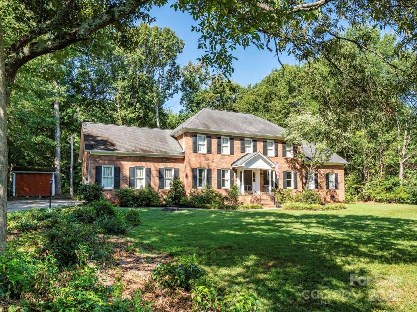 1231 Bennington Drive, Concord, NC 28027.  MLS# CAR4285344, YatesRealty ID 33260. WELCOME TO THIS BEAUTIFUL CUSTOM BRICK HOME IN FREEDOM ACRES