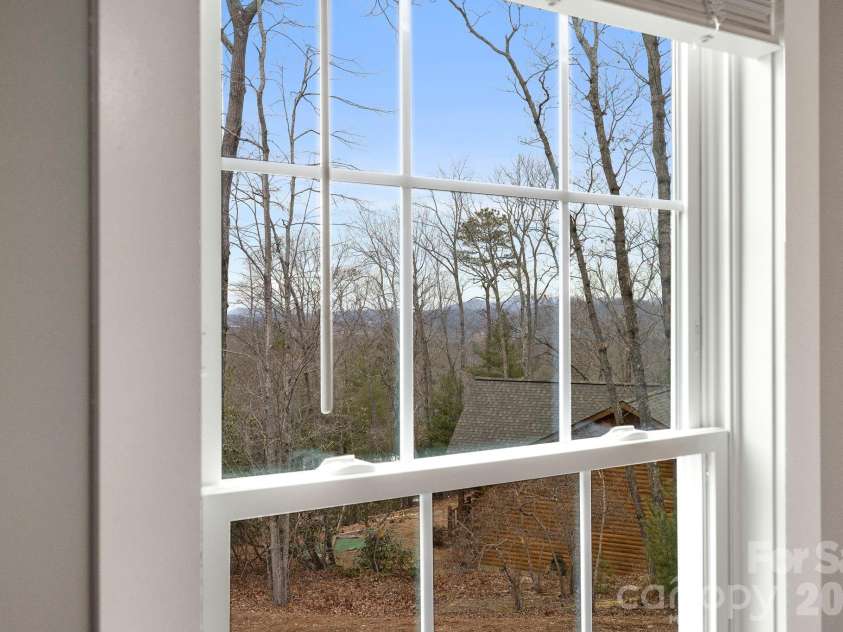 70 Jp Huggins Drive, Hendersonville, NC 28791.  MLS# CAR4277008, YatesRealty ID 33262. Beautiful Winter Mountain View from Bedroom.
