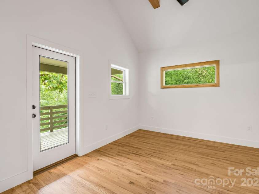 70 Teague Road, Marshall, NC 28753.  MLS# CAR4290135, YatesRealty ID 33263. Primary Suite with Cathedral Ceilings and Beams