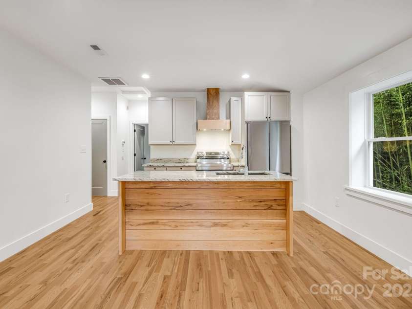 70 Teague Road, Marshall, NC 28753.  MLS# CAR4290135, YatesRealty ID 33263. Room for Both Formal Dining Area and Breakfast Bar 