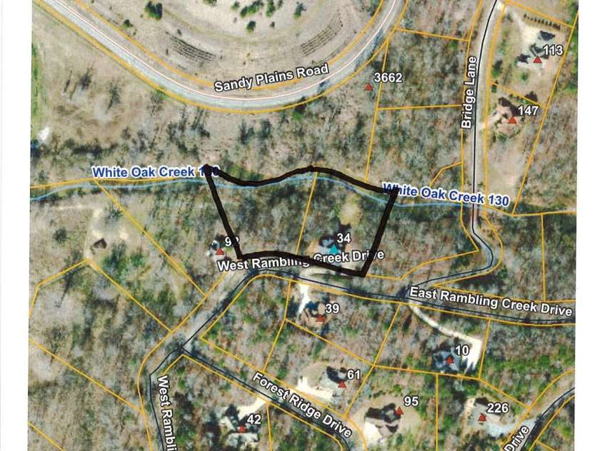 34 Rambling Creek, Tryon, NC 28782.  MLS# CAR4288556, YatesRealty ID 33265. 