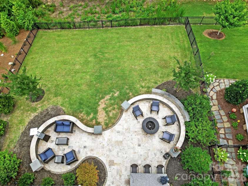 404 Sensibility Circle, Fort Mill, SC 29708.  MLS# CAR4387912, YatesRealty ID 33266. Backyard Patio - Gilling area, Fire Pit, Entertaining, Fenced Backyard